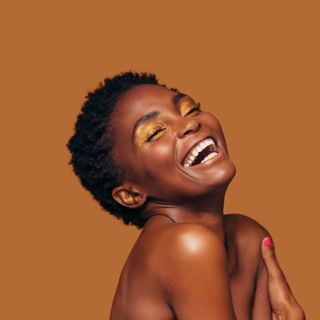 Black woman with natural hair learning customized routine for moisture and growth