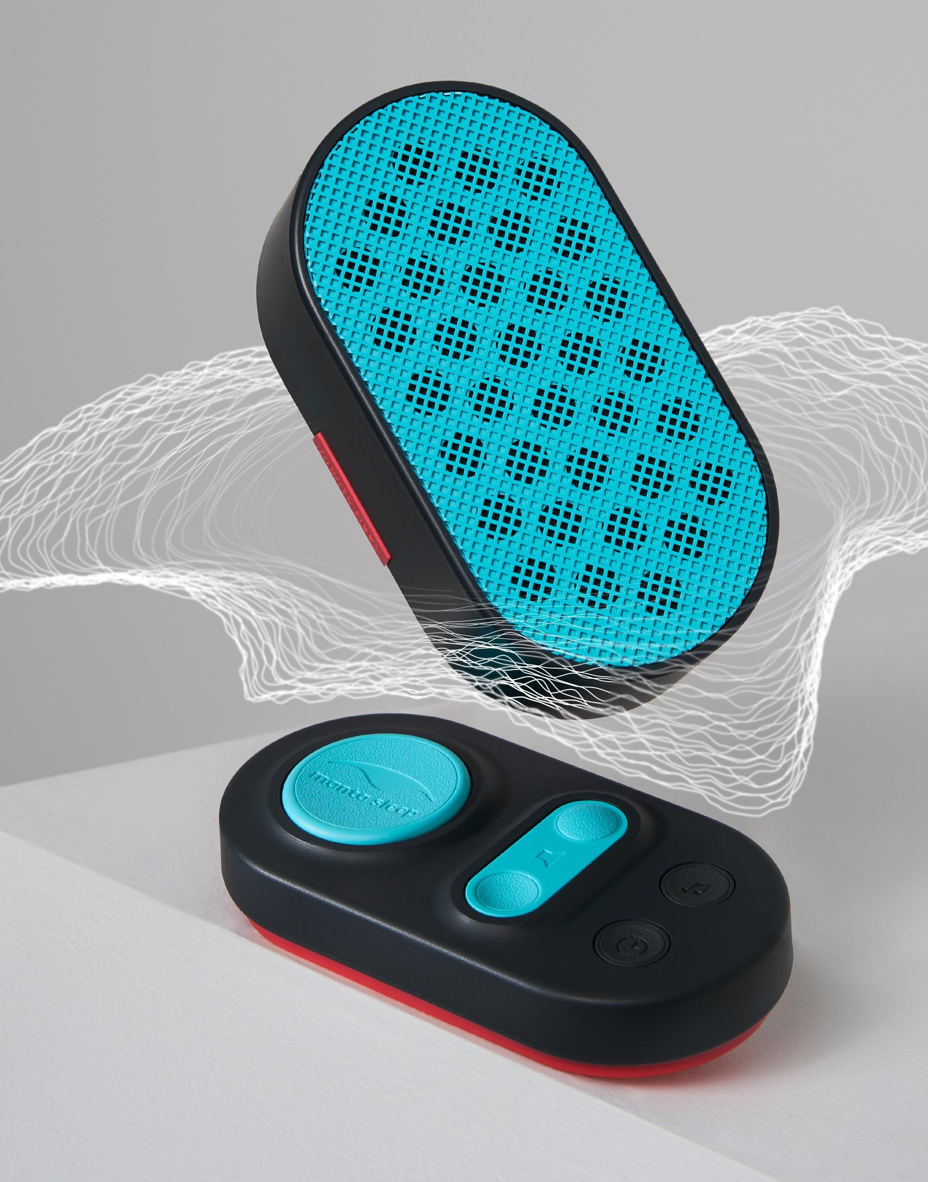 The control pad and speaker of a sound machine that plays white and red noise, surrounded by white sound waves.