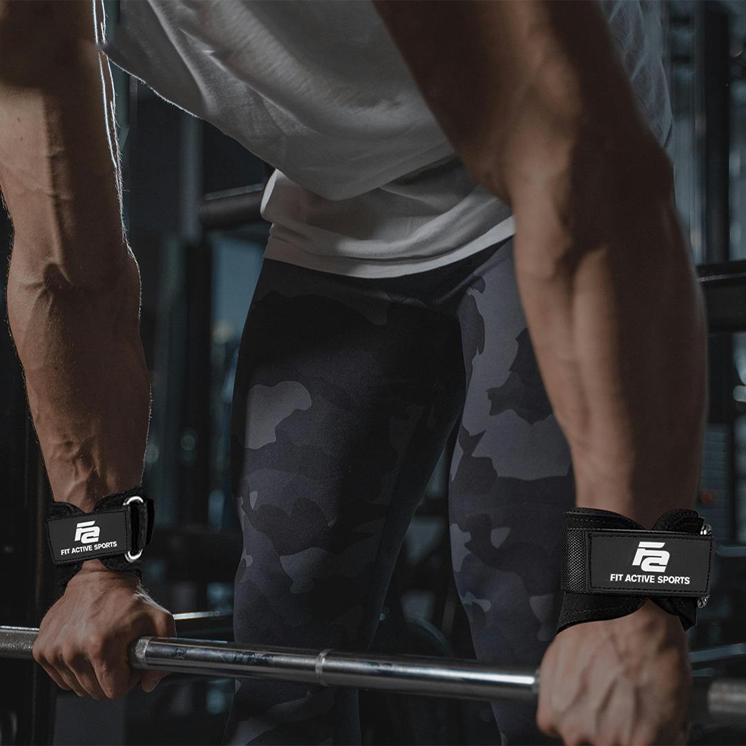 Woman approaching barbell with weights wearing lever belt