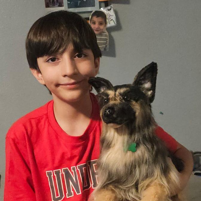 Happy pet owner with stuffed animal