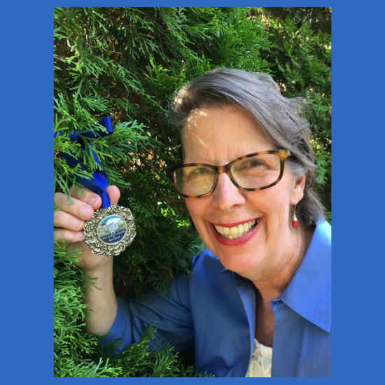 Catherine holding Christmas ornament 