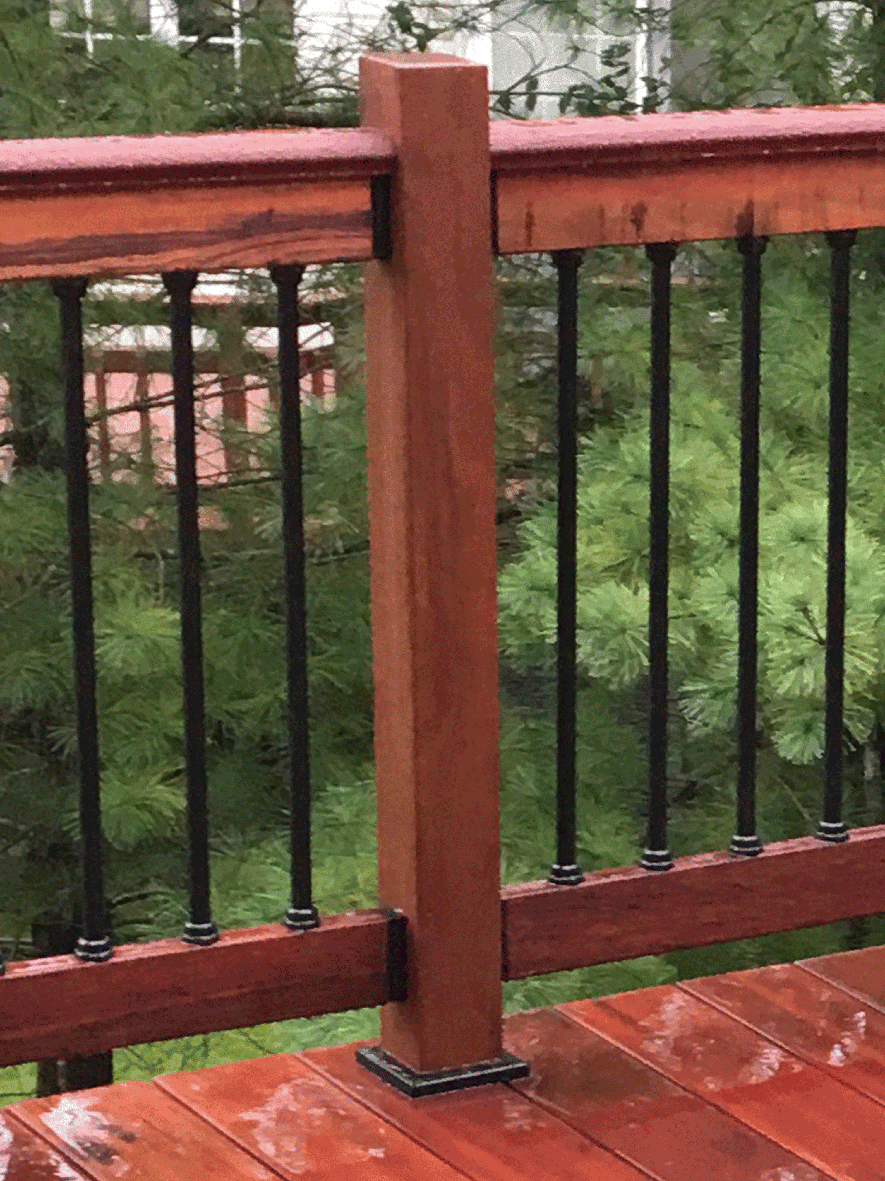 A picture of the finished stained post with a Titan Post Anchor as it's base
