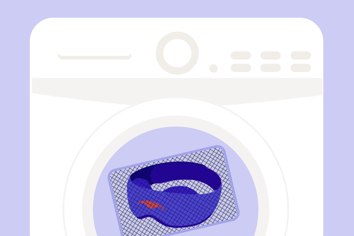 A blue washable silk eye mask in a washing machine.