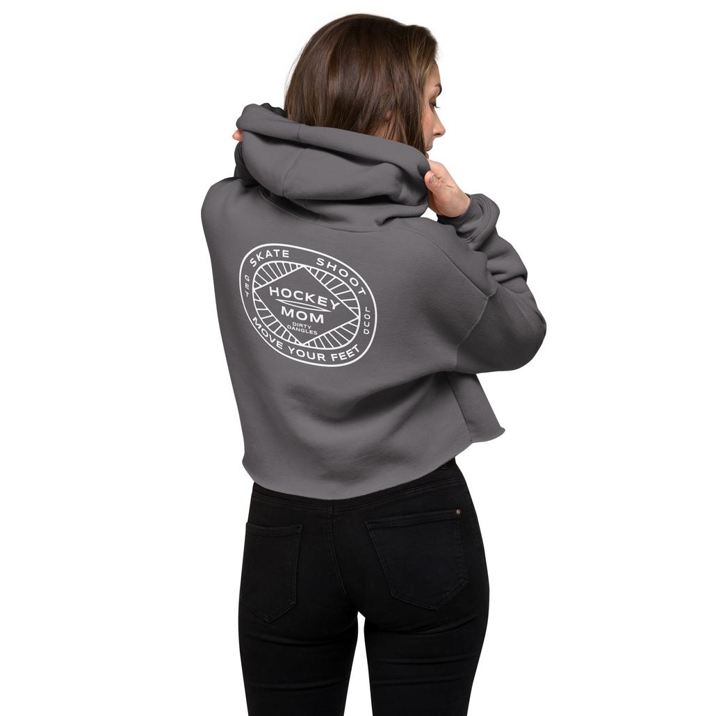 A hockey mom in a gray crop hoodie. hockey mom insignia