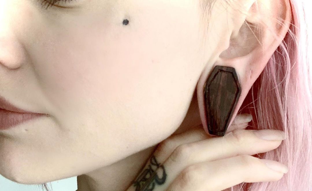 How do I get my coffin plugs into my stretched ears