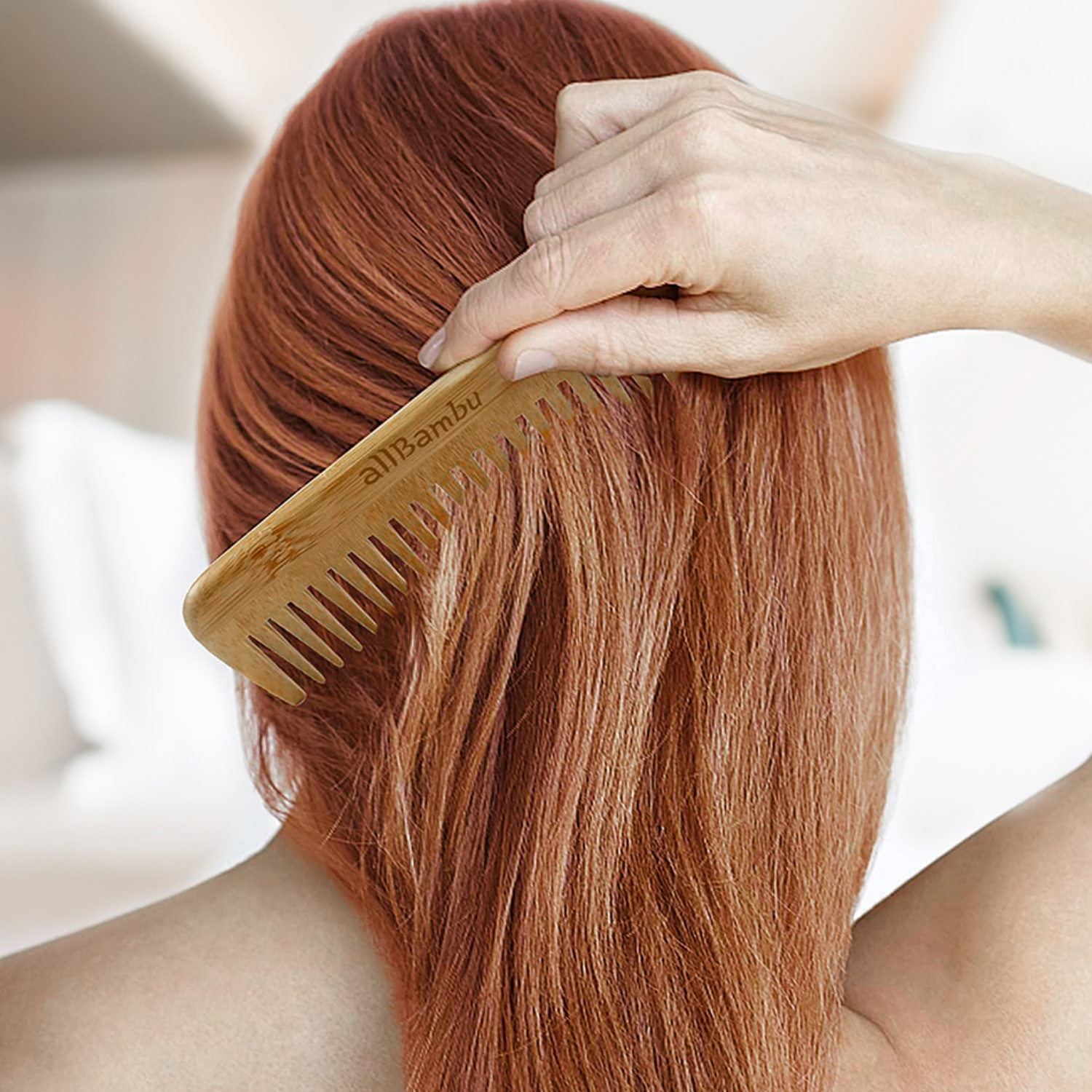 Bamboo comb combing hair