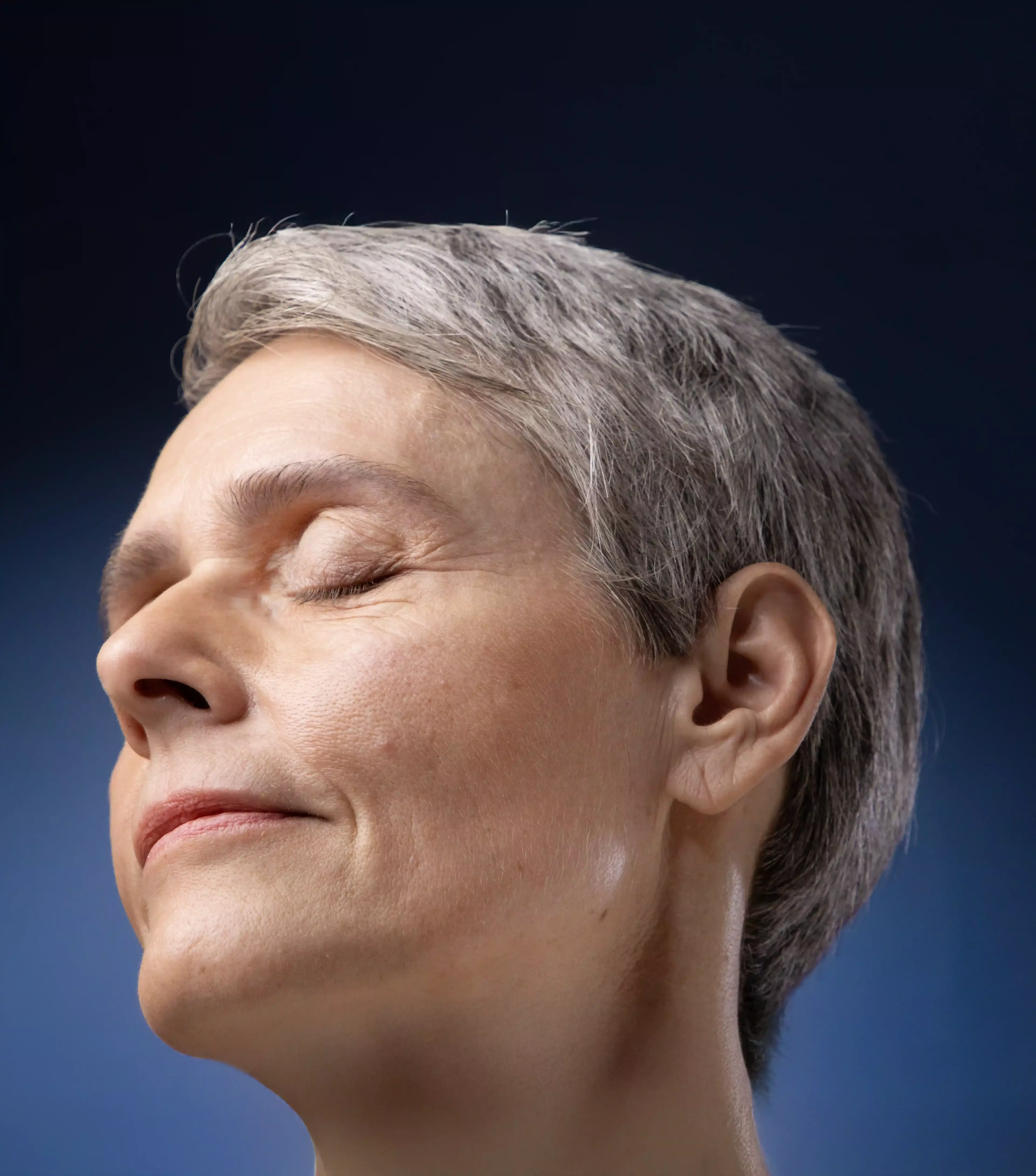 A woman showcasing Firmer-Looking Skin