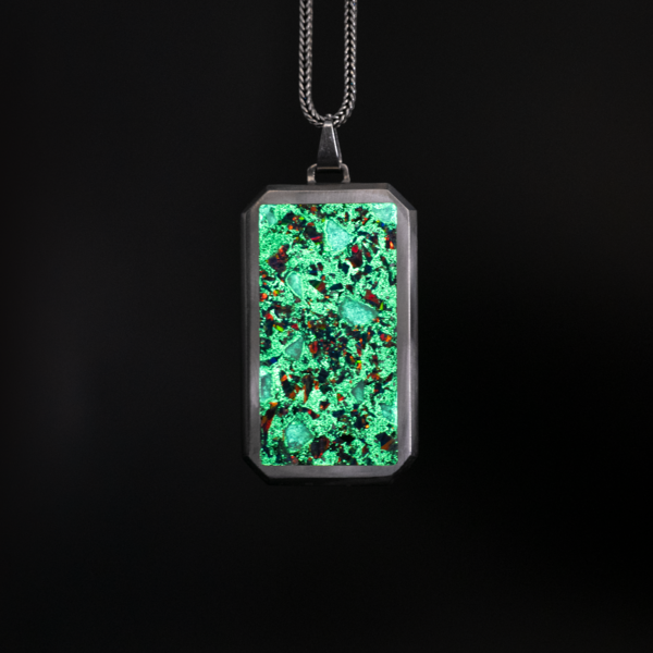 The Ember Glowstone Pendant is a handcrafted glow in the dark pendant, with a unique design