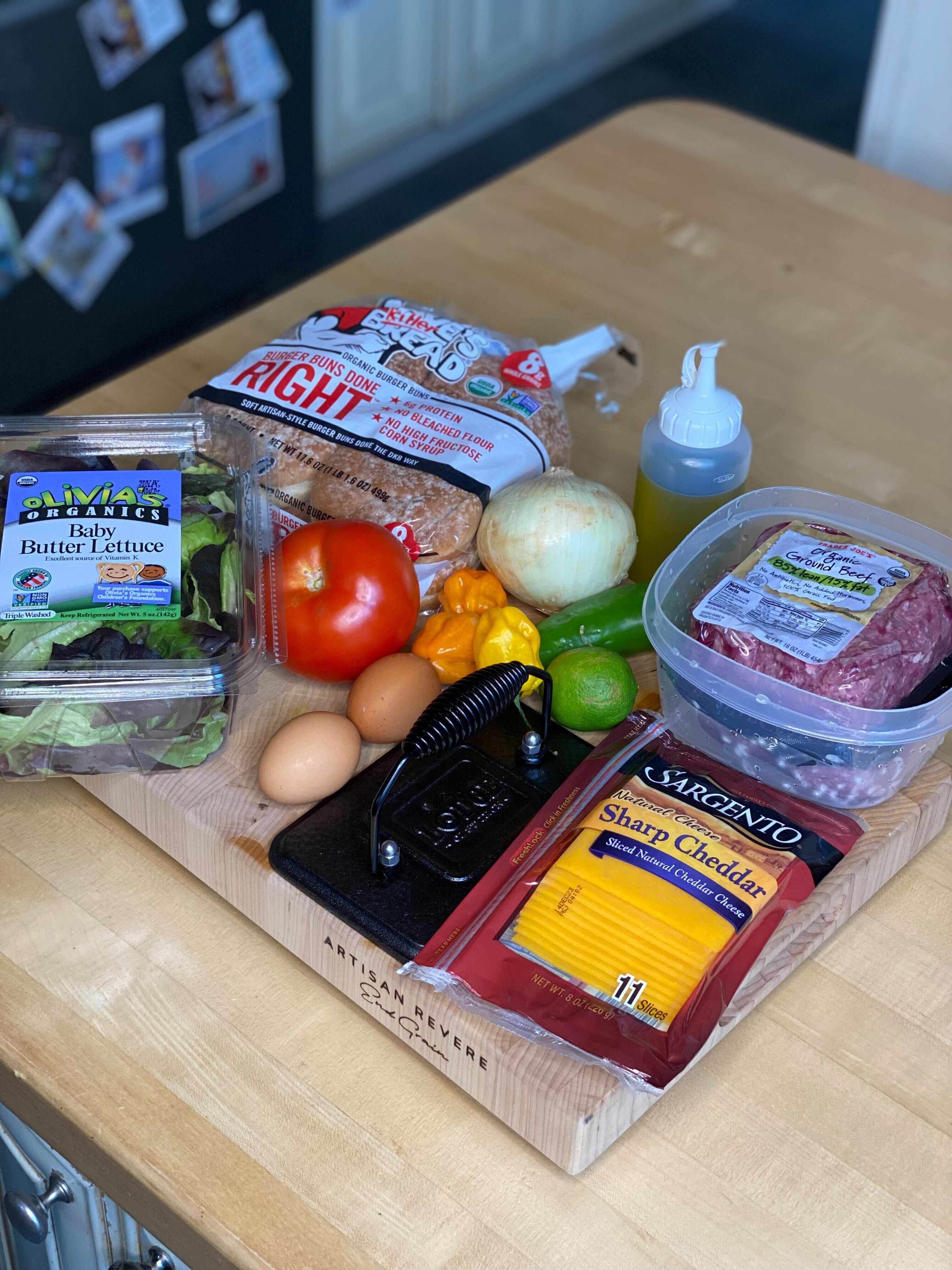 Ingredients for smash cheeseburgers: buns, evoo, burger meat, cheddar, eggs, lime, jalapeno, chipotles, onion, lettuce, eggs