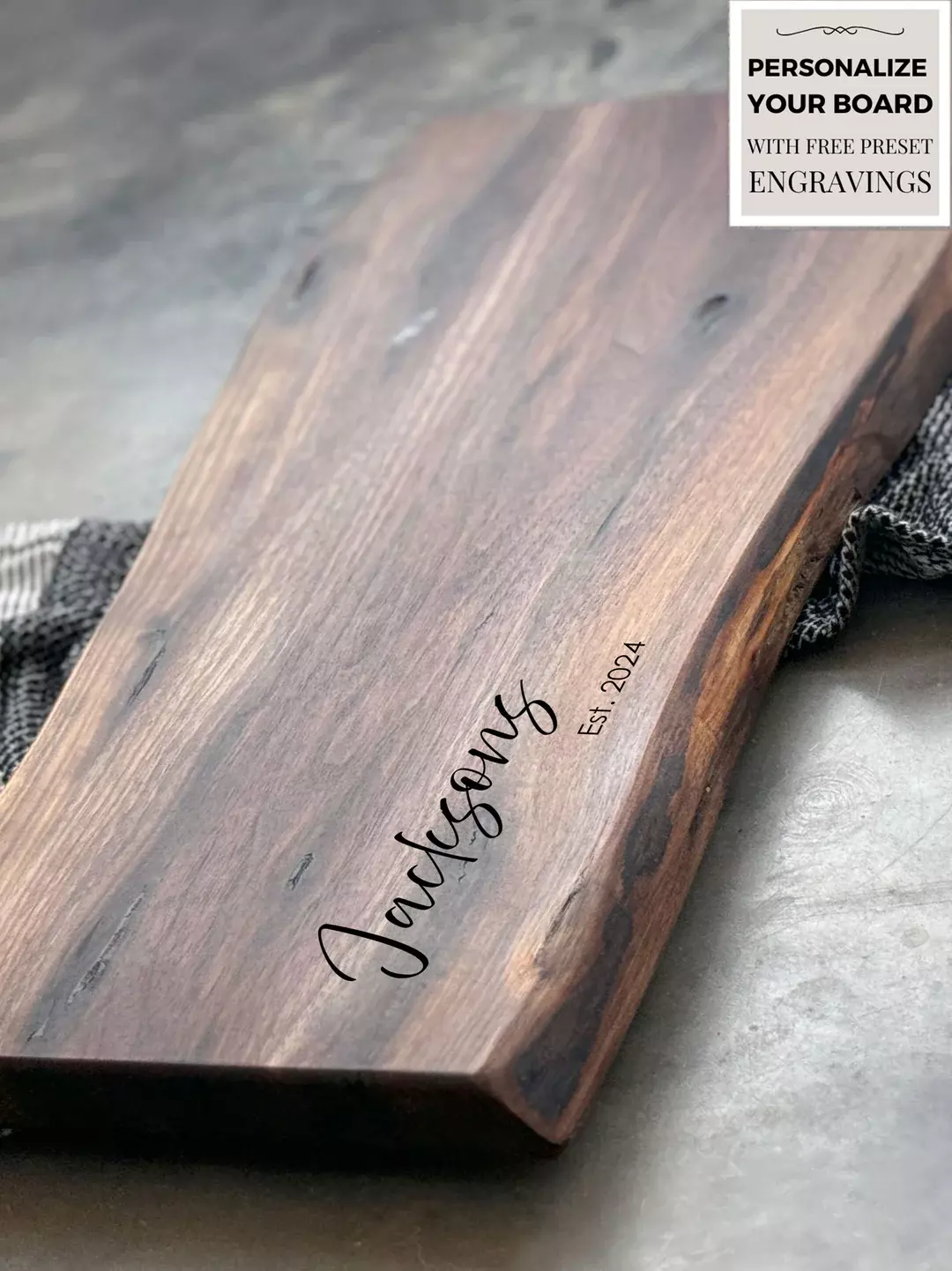 personalized live edge charcuterie board with no handles. Showing engraving on board.