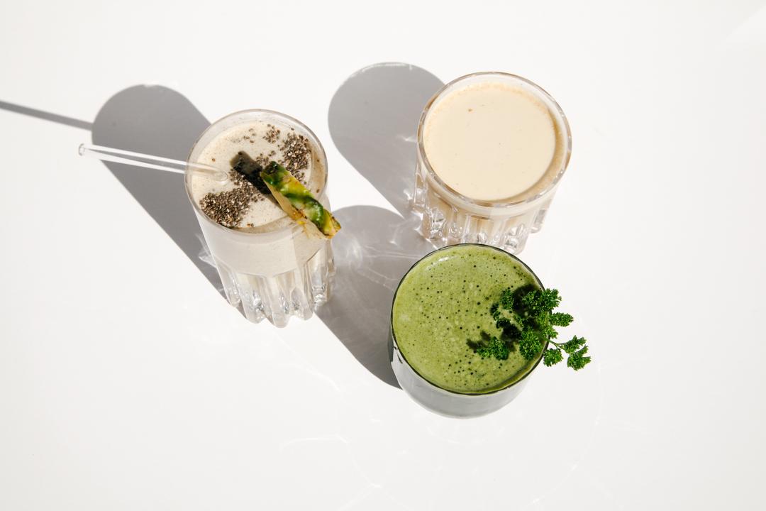 Top view of mixed Maintenance Cleanse drinks
