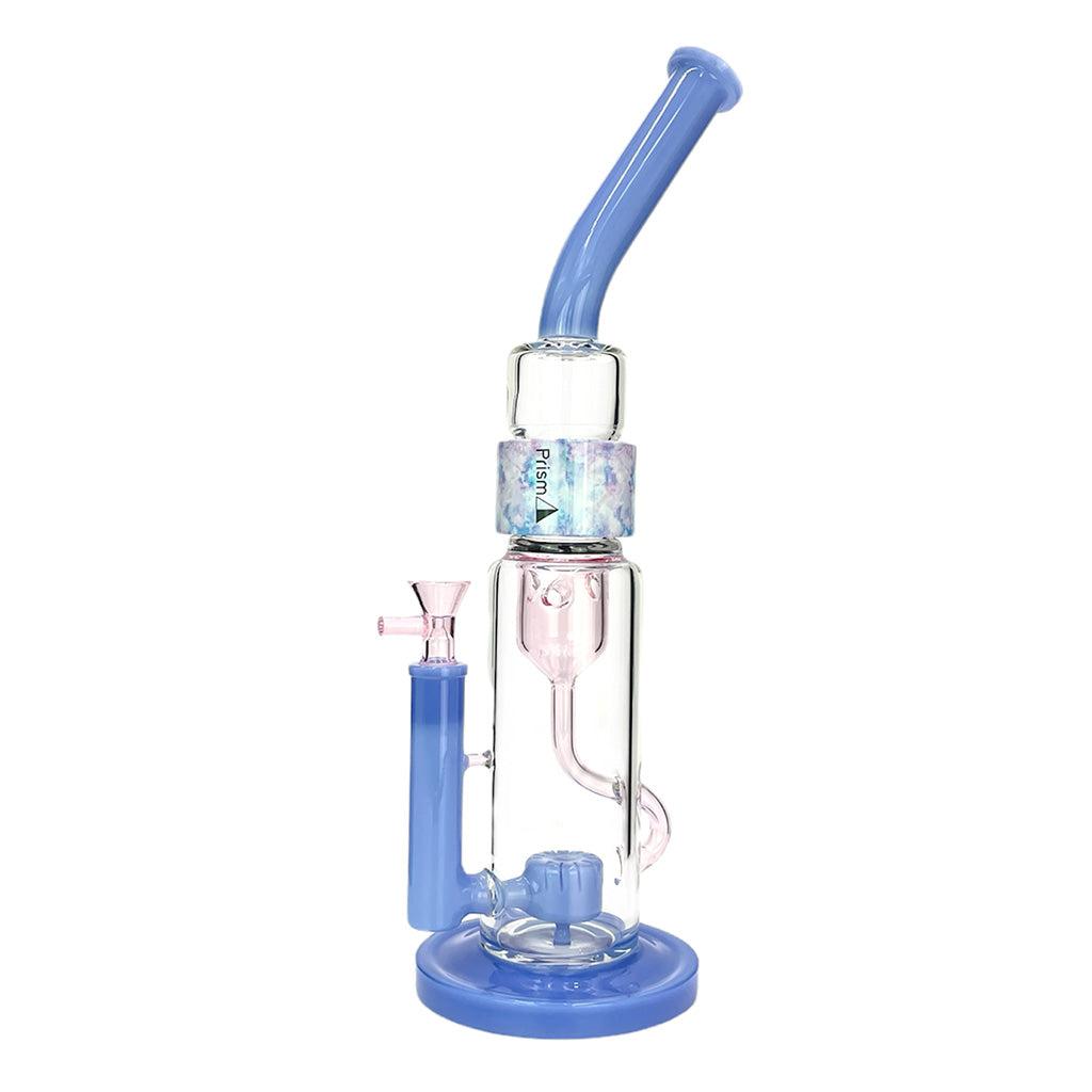 The Prism Klein Incycler modular dab rig in the 'Cotton Candy' Pink and Blue colorway. This image illustrates the internal drainage and recycling chamber of a high-performance dabbing rig, designed to keep water in constant motion for maximum cooling and flavor preservation of concentrates. A prime example of a professional borosilicate glass dab setup.