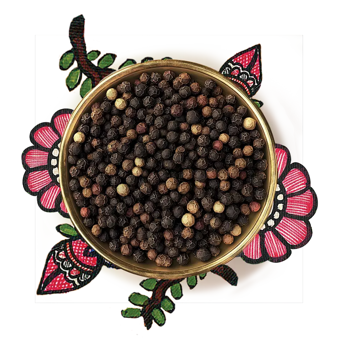 Black pepper kept in a bowl over an artwork of bright pink flowers and leaves