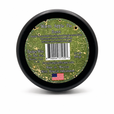 The back of A tin of dirty dangles screamin eagle 4th of july stick wax on a white background