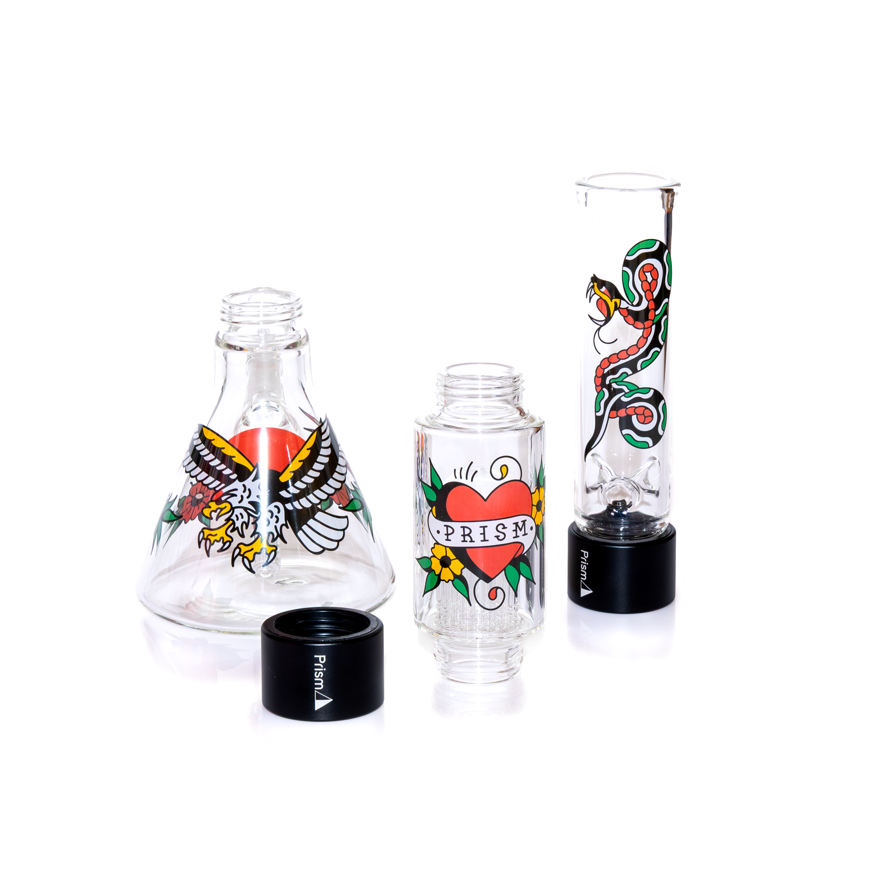 "Exploded view of a Prism Inked Double Stack Beaker Bong disassembled into its core components. The image shows the borosilicate glass beaker base, two black Halo connectors, a big tree percolator, and a tall mouthpiece, all featuring permanent American Traditional tattoo decals. This modular setup highlights the interchangeable threaded system designed for easy cleaning and part replacement."