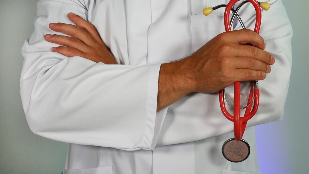 Doctor Standing With Arms Crossed