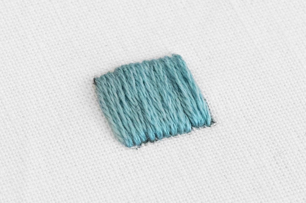 A full square of satin stitch has been created.