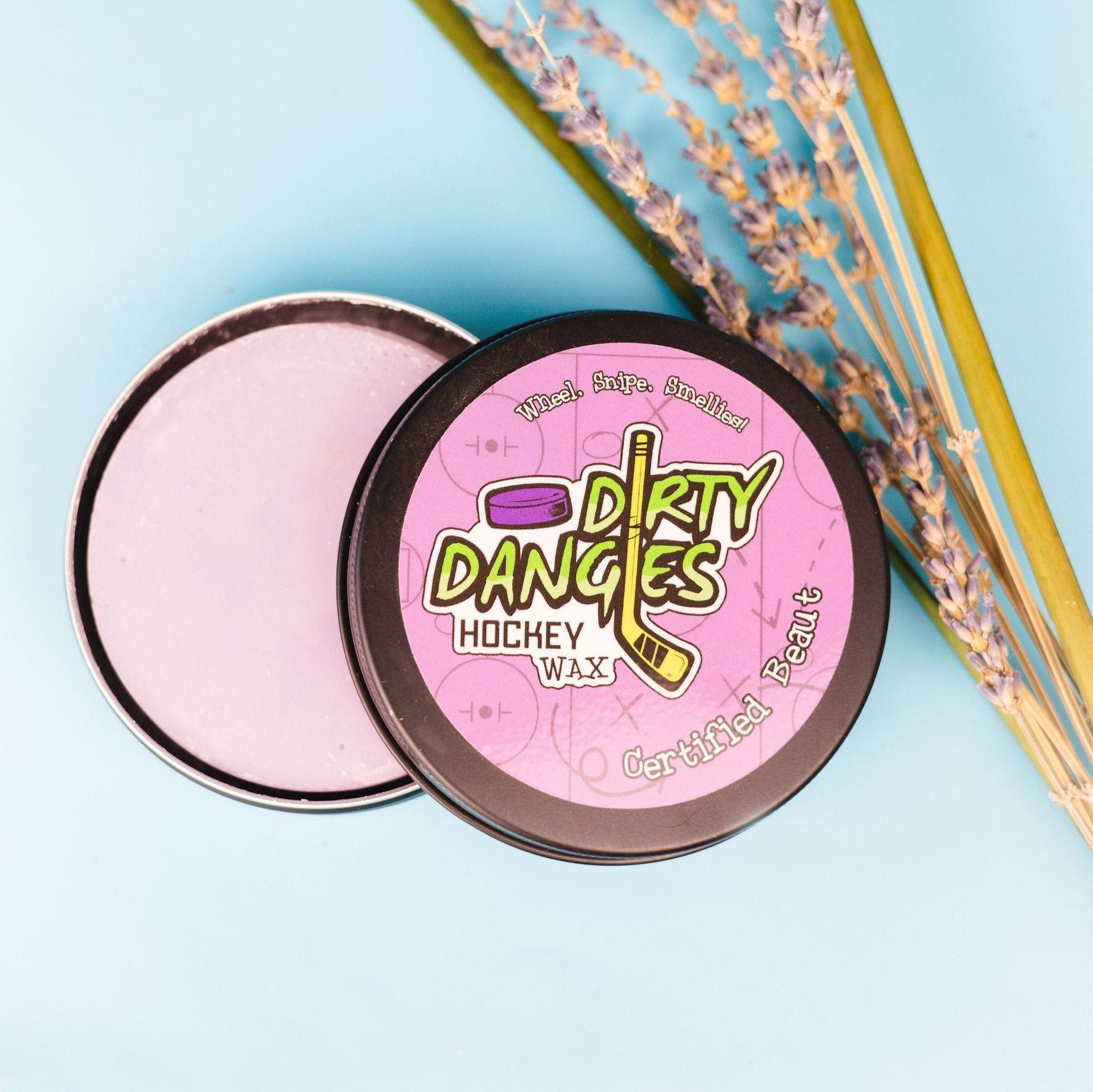 certified beaut girls hockey stick wax on a blue background with lavender and lemongrass