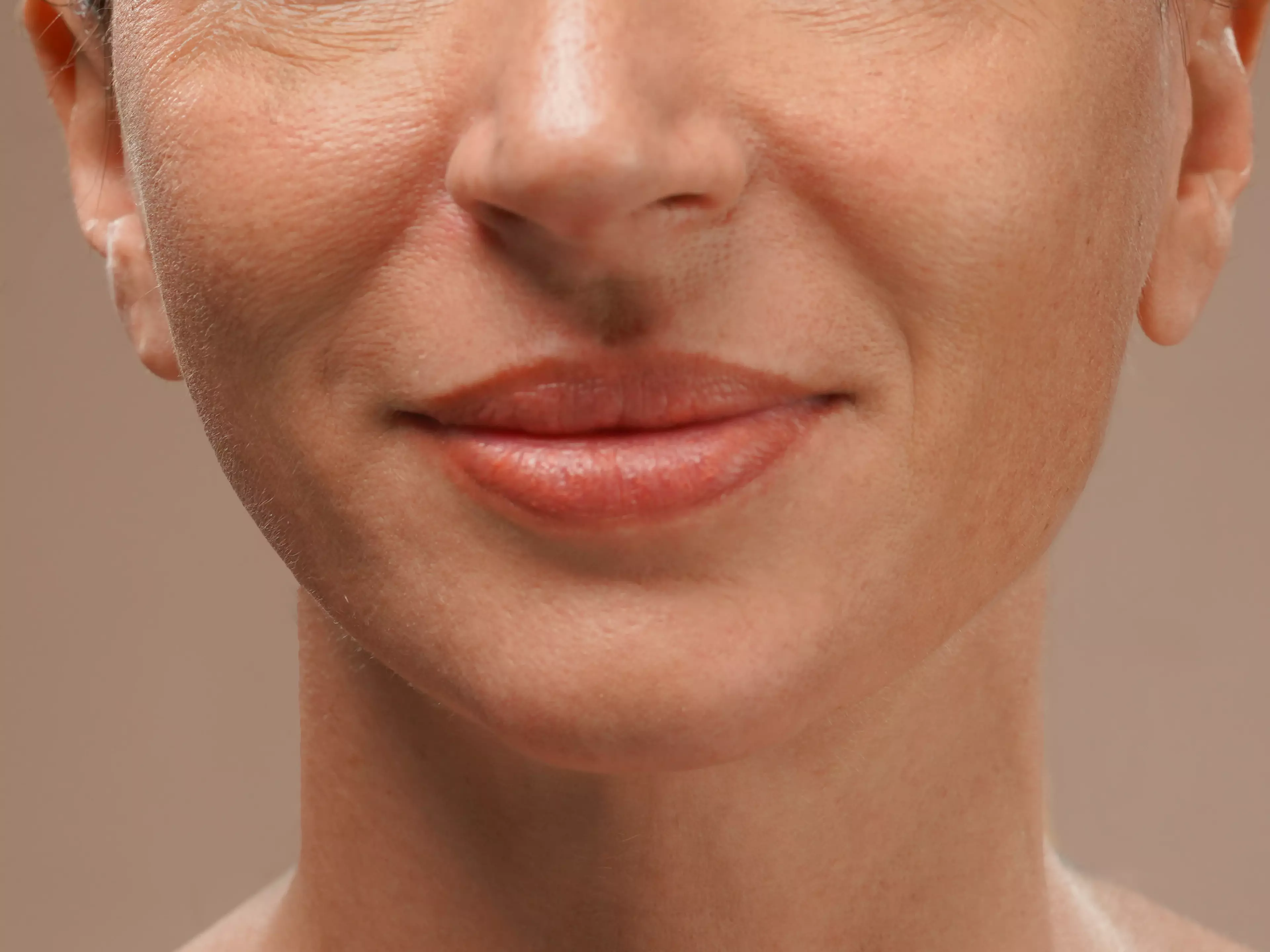 A woman with a vibrant smile