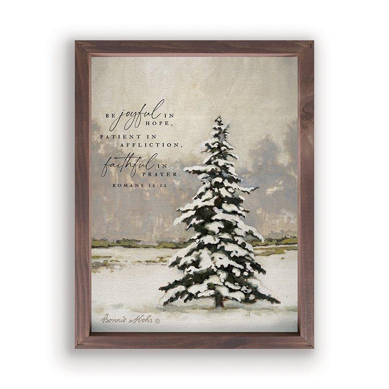 Christmas tree with snow with Bible verse: Be joyful in hope, faithful in prayer