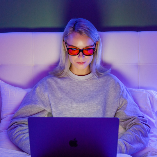 Caucasian female using laptop wearing classic night swannies