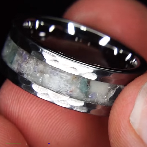 The Frostbite Ring is a unique Hammered Tungsten Ring