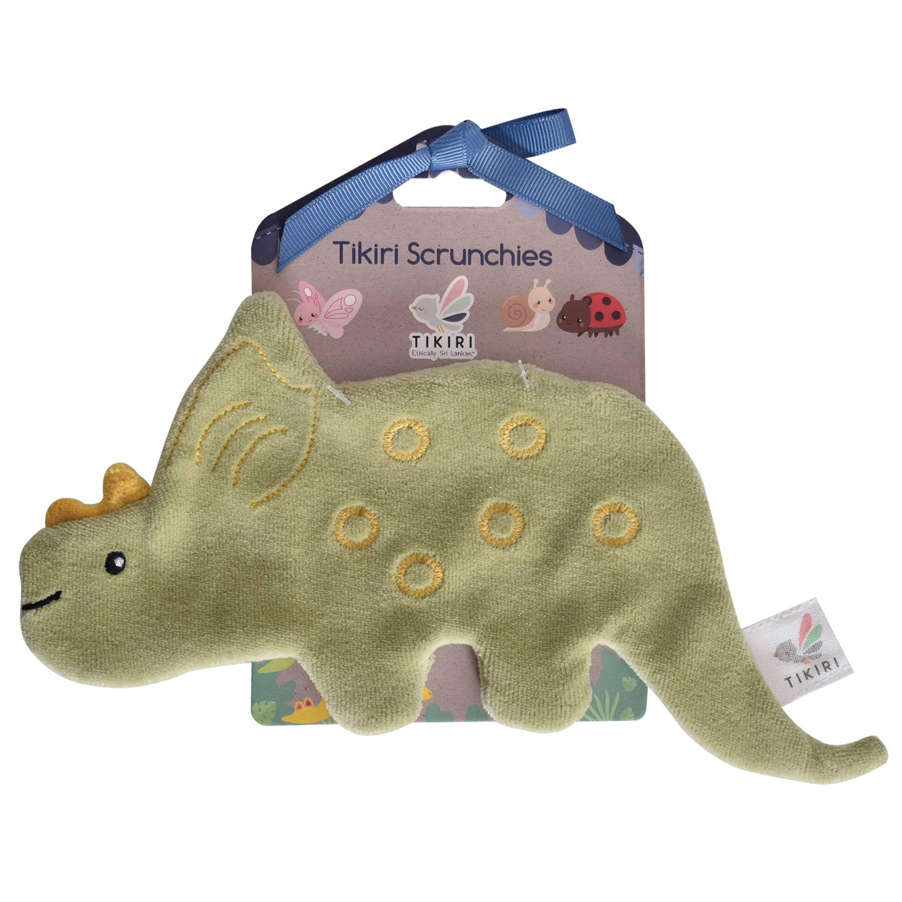 Baby sleeping with pink octopus toy