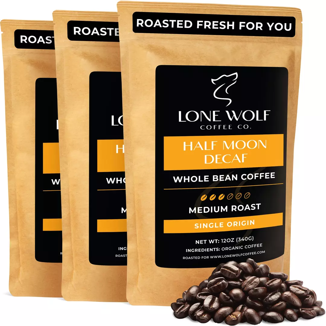 Three 12oz bags of Lone Wolf Coffee’s Half Moon Decaf Medium Roast Whole Bean coffee bag product photo