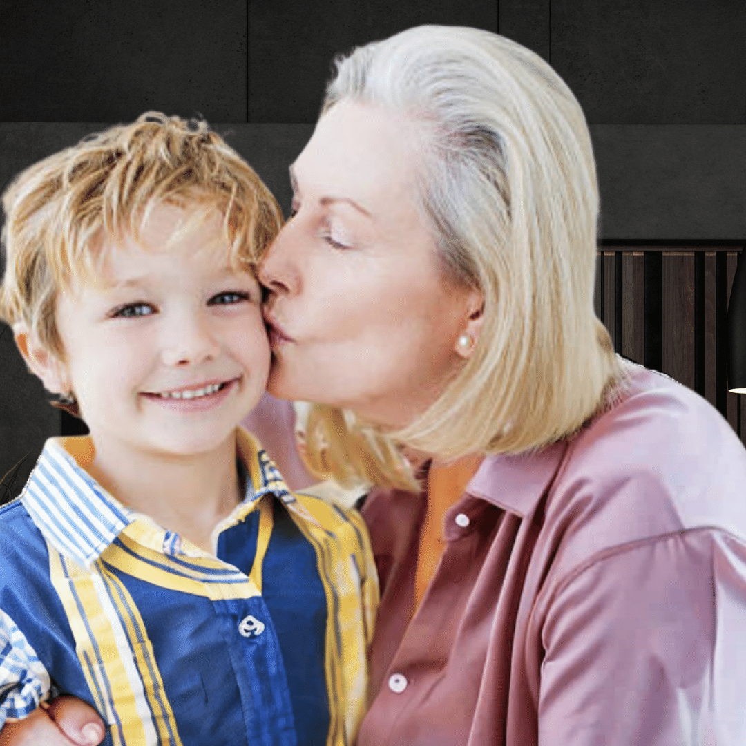 Grandmother kissing her smiling grandson, showcasing improved confidence.