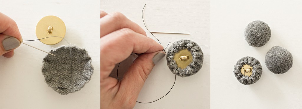 Fabric is sewn around a button.
