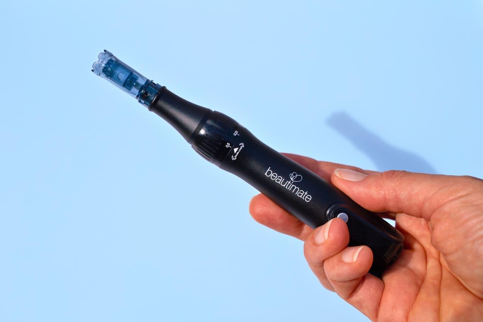 lifestyle photo microneedle derma pen by beauitmate with hyaluronic acid serum for glowing radiant skin