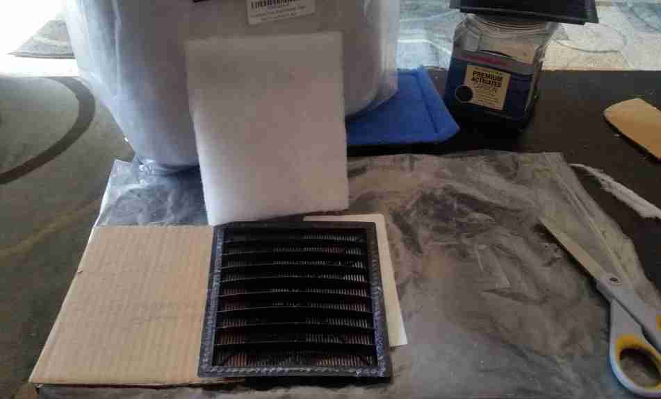 Dual Density filter pad cut out with marineland plastic filter cartridge