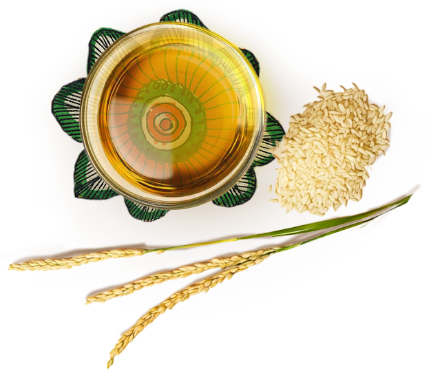 Rice Bran oil, in a transparent glass bowl, kept on an artwork of a flower, with rice bran on the side