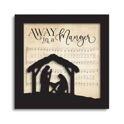 Away in a Manger musical notes with nativity silhouette