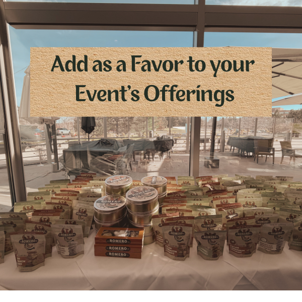 cookie bags favors and tins lined up on a table
