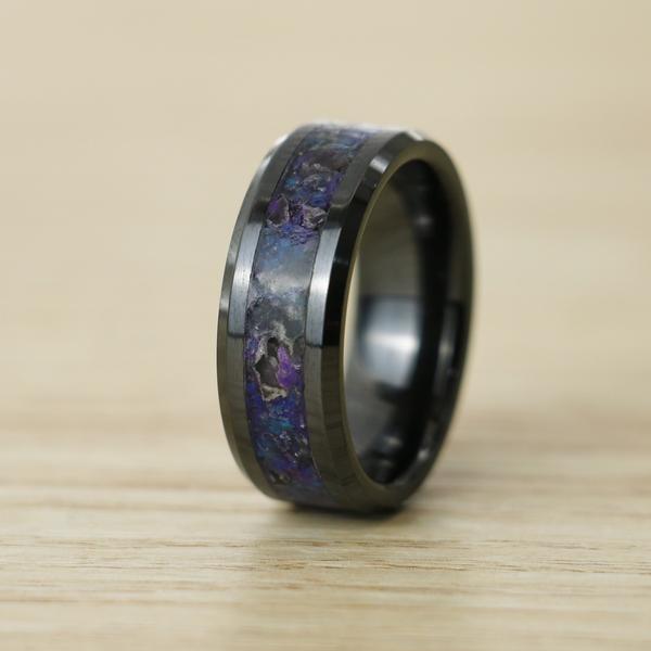 The Ceramic Glowstone Ring is a customizable black ring that is made on a black ceramic band