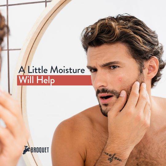 man holding his face while looking at a mirror, broquet logo, text reads: A little moisture will help