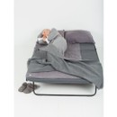 Elderly woman sleeping on large grey PeapodMat - washable and 100% leakproof bed mat.