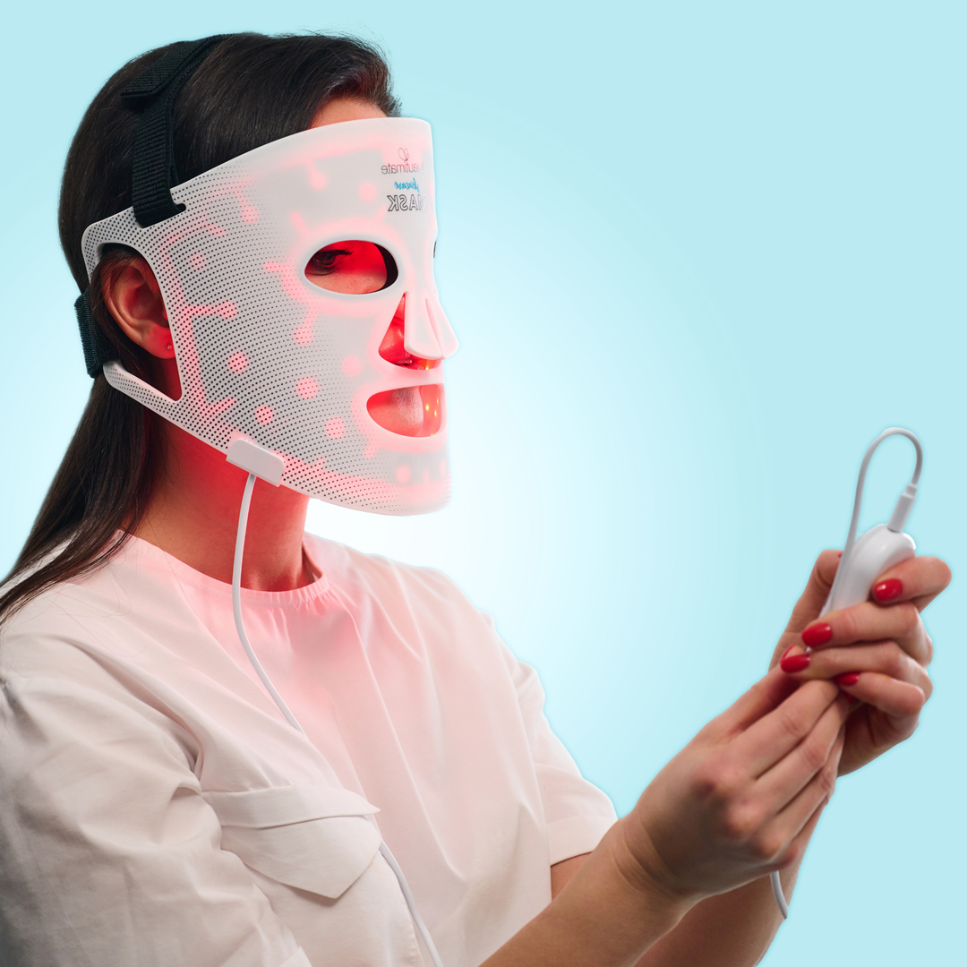 woman wearing our mask and using red light therapy