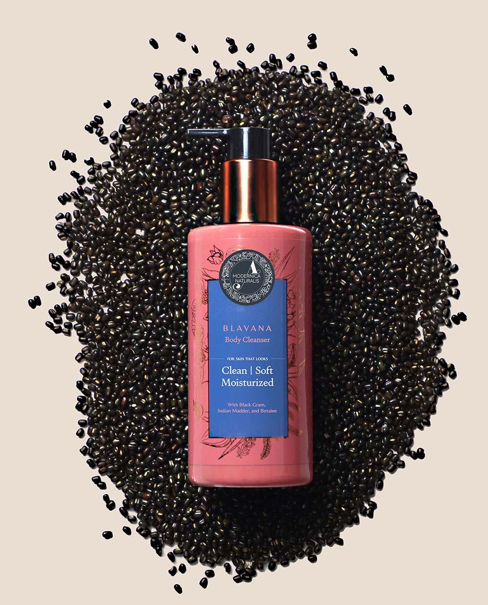 the image strategically highlights black gram as a core ingredient in the Blavana Body Cleanser, to showcase the natural, high-quality components used in this skincare item.