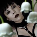 Lily of the Valley eau de parfum film still with a depiction of death as beautiful woman flanked by lily flowers