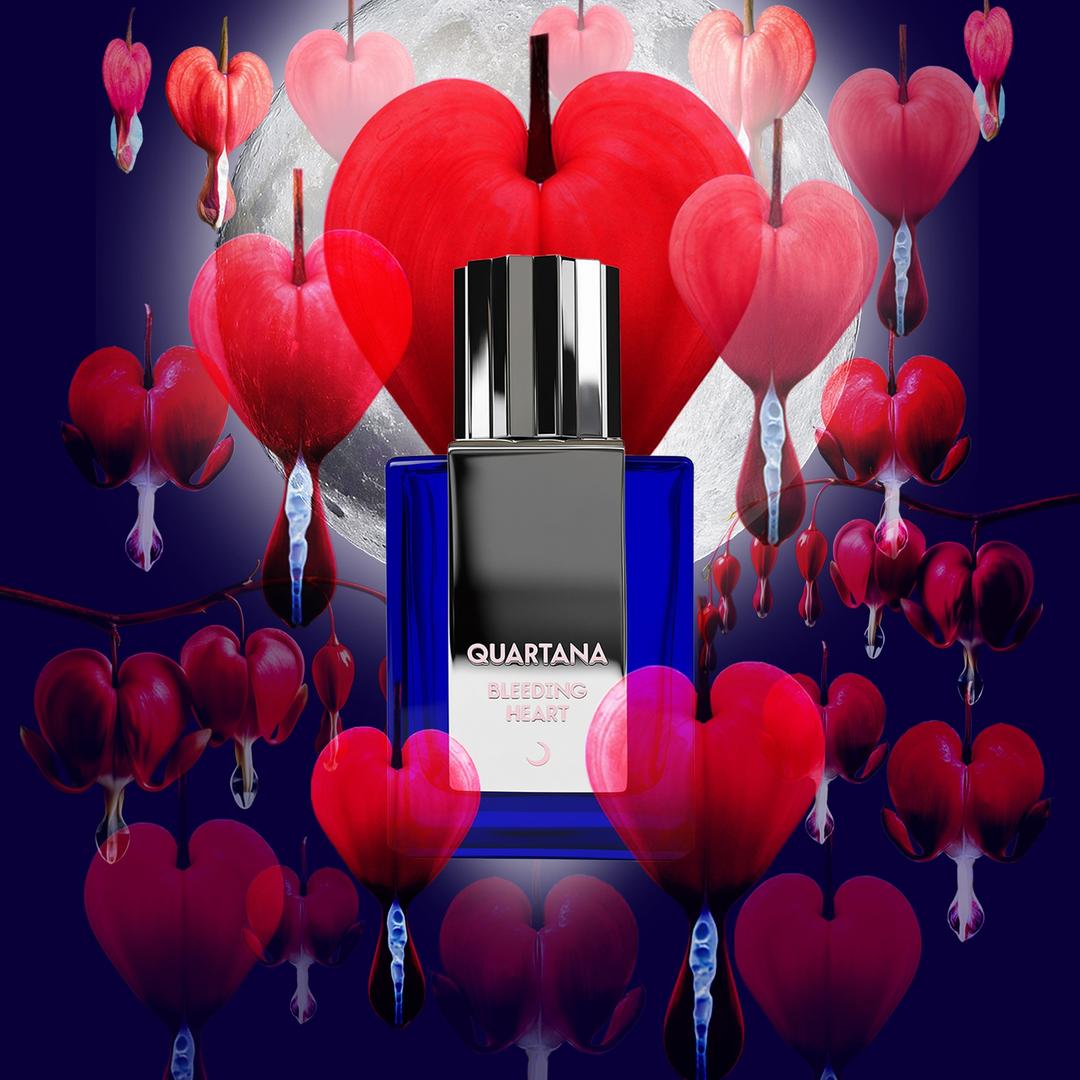 BLeeding Heart bottle in front of a full moon and surrounded by Bleeding Heart flowers