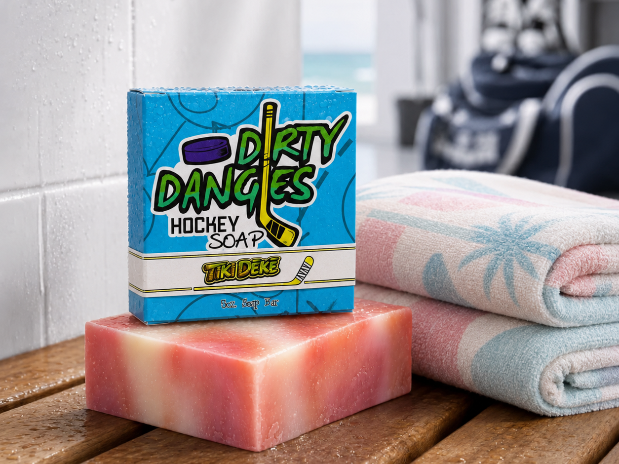 a bar of tiki deke tropical coconut girls hockey soap inside a clean hockey locker room with a pink white and blue beach towel.