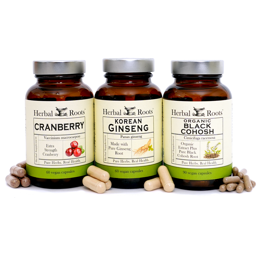 Bottle of Herbal Roots Cranberry, Korean Ginseng and organic Black Cohosh next to each other.