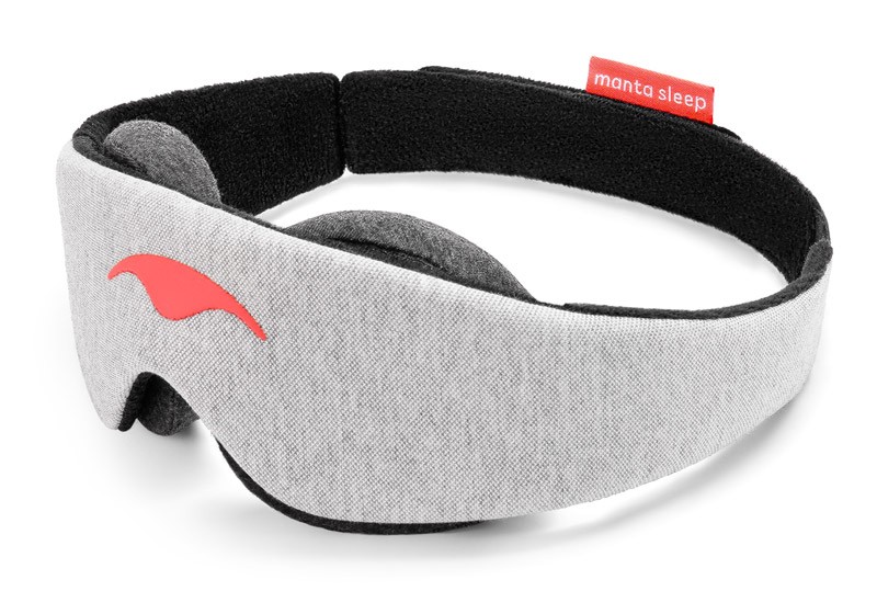 A gray adjustable eye mask with modular eye cups.