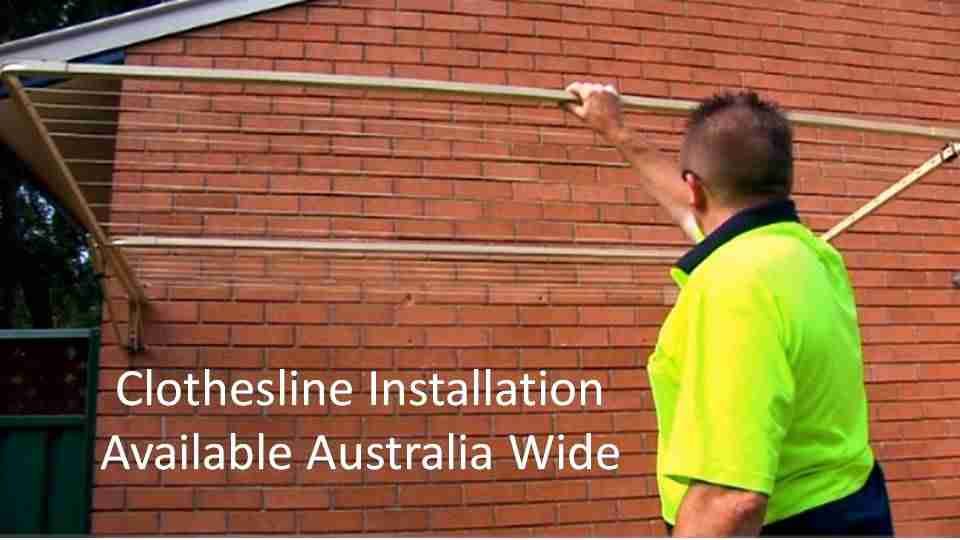 2200mm wide clothesline installation service showing clothesline installer with clothesline installed to brick wall