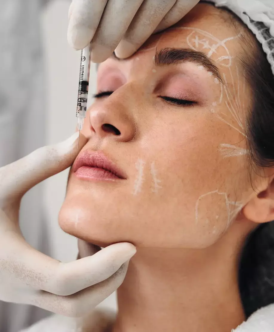 Woman getting face lift treatment