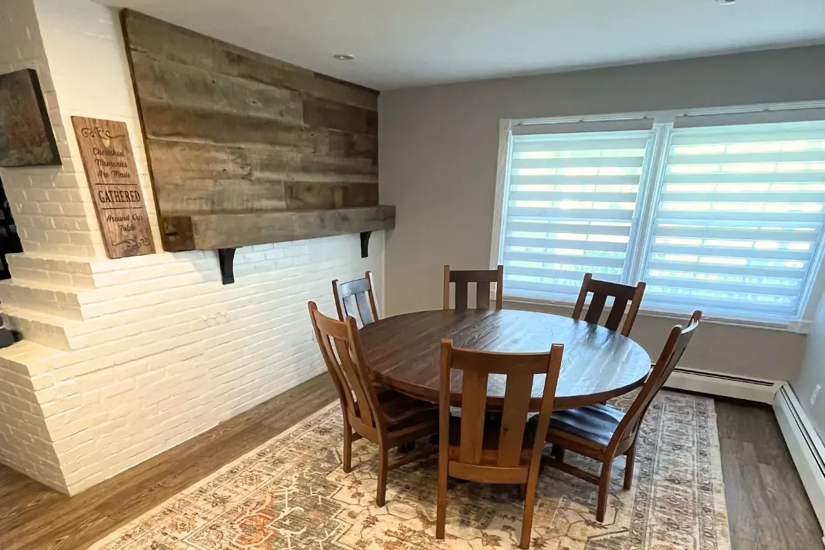 Barnwood Wall and Mantel accent with barnwood round table and chairs