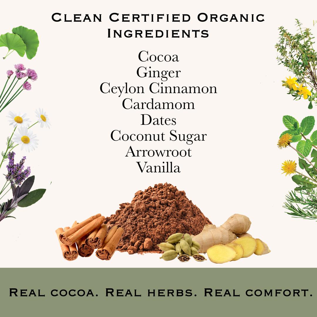 Clean certified organic ingredients; cocoa, ginger, Ceylon cinnamon, cardamom, dates, coconut sugar, arrowroot, vanilla. Real Cocoa. real Herbs. Real Comfort. There is a pile of cocoa with cinnamon sticks, cardamom pods and ginger surrounding it. On both sides of the image are flowers going up the sides.