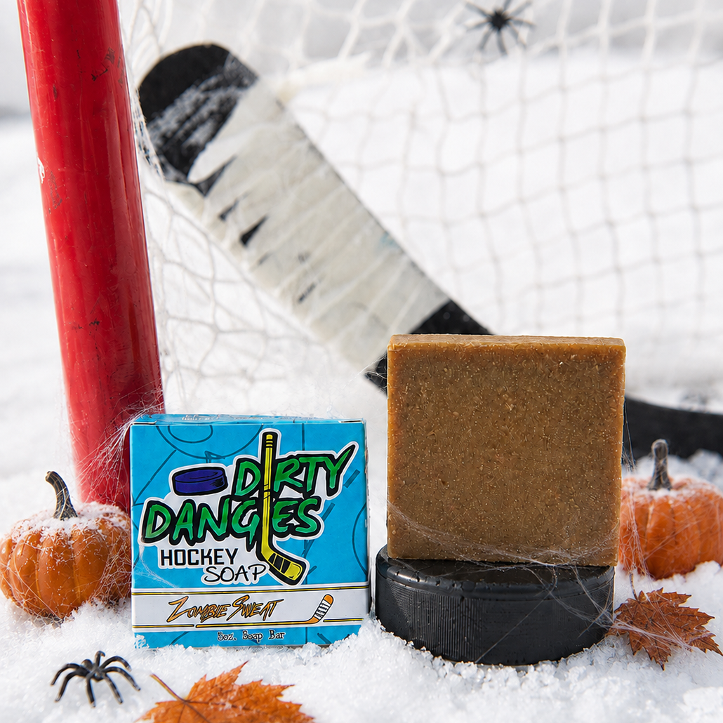 top shelf christmas oatmeal spice hockey soap bar with blue box in the snow with hockey gear and christmas decorations.